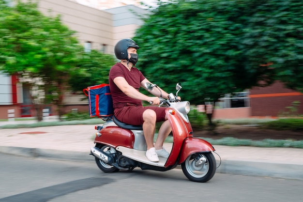 Food Delivery guy on a motorbike