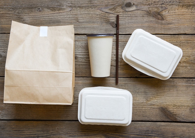 Photo food delivery in take away boxes, disposable eco food packaging paper cup and craft paper food