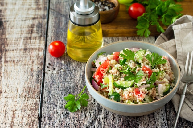 Food dieting concept tuna salad Couscous salad with conserved tuna tomatoes cucumbers