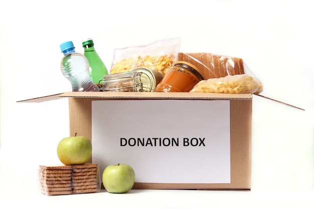 Photo food donation box isolated on white closeup