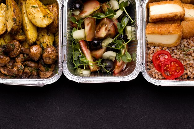 Photo food in foil containers close-up.