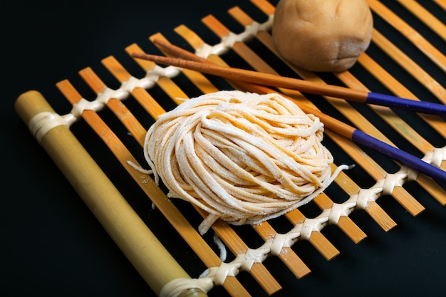 Premium Photo | Food fresh raw homemade oriental asian, chinese egg noodles