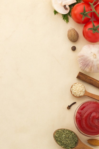 Food ingredients and spices on aged background