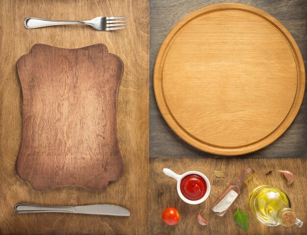 Food ingredients and spices with cutting pizza board at wooden table, top view