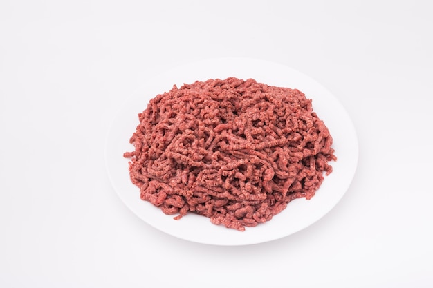 Photo food, national cuisine and delicious concept - isolated raw minced beef.