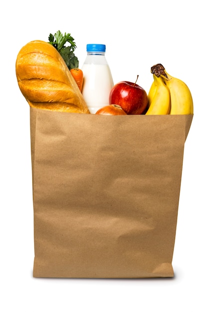 Food in paper bag on white, isolated.