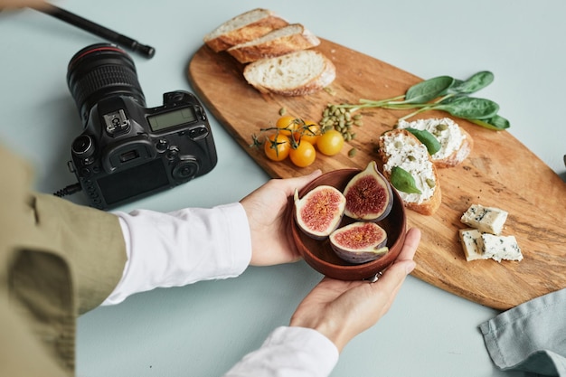 Food Photographer Setting Scene