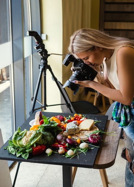 Photo food photographer at work. modern equipment to make quality photos. creativity art hobby leisure concept