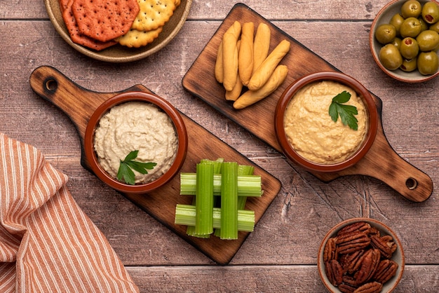 Food photography of appetizer hummus and bread sticks