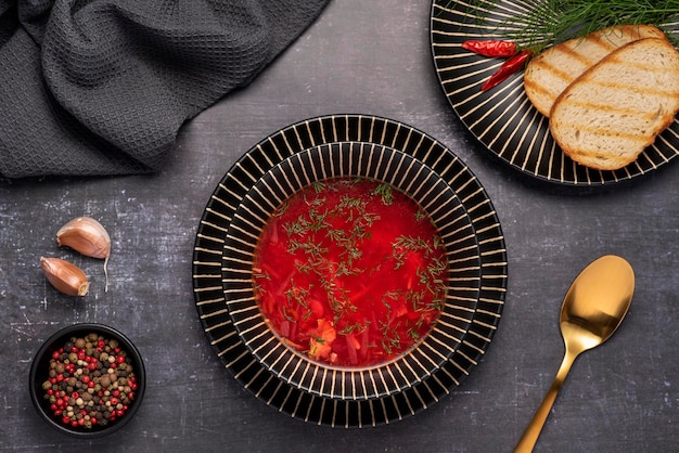 Food photography of beetroot soup dill and toast