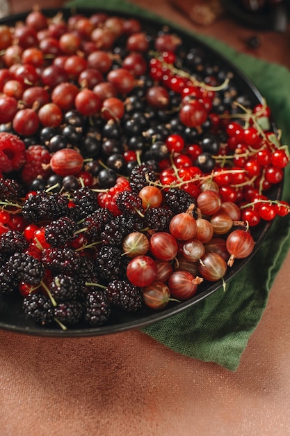 food photography in low key fruits and berries vitamins food for vegatarin