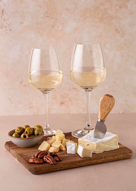 Food photography of white wine with cheese