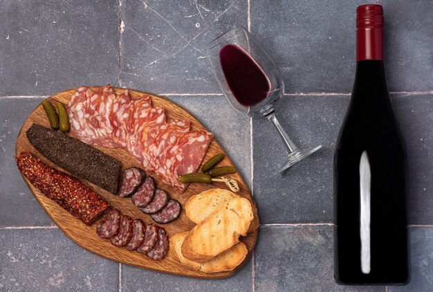 Food photography of wine and salami