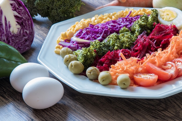 Food plate with healthy colorful salad.