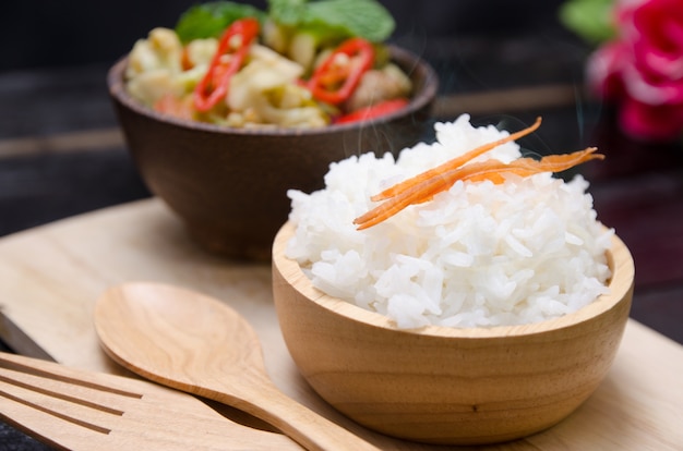 Food Rice and healthy broccoli stir fry in cup wooden