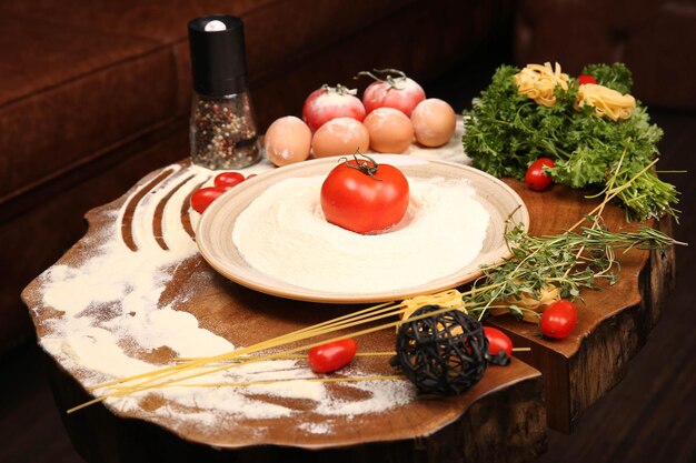 Food Styling Freshly vegetables flour and spices on the table cook