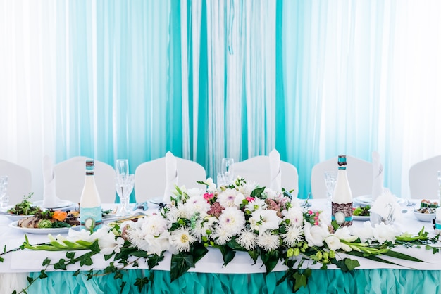 Food table decorated with flowers