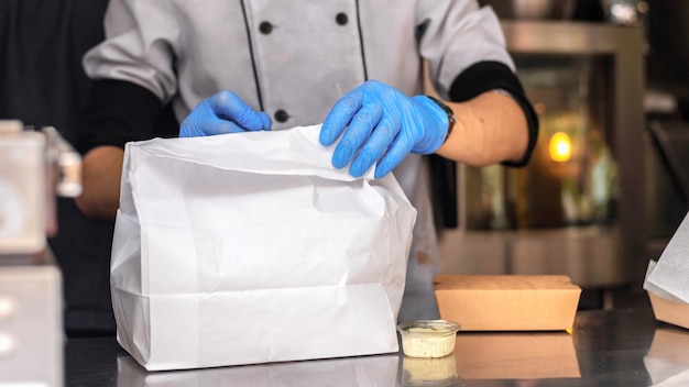 Food truck, cook finishing an order