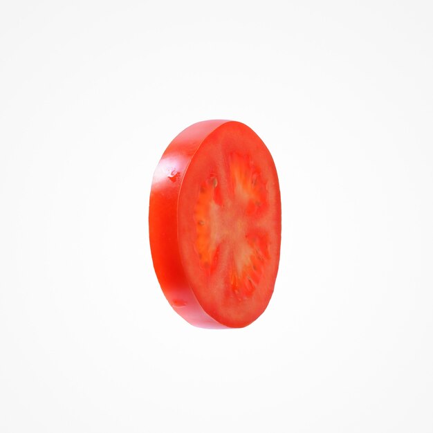 Food vegetable composition. Healthy colorful slice tomato isolat on blank studio background.