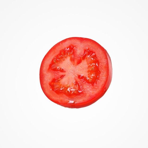 Food vegetable composition. Juice red slice tomato isolat on white studio background.