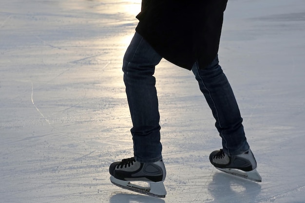 Foot ice-skating person on the ice rink