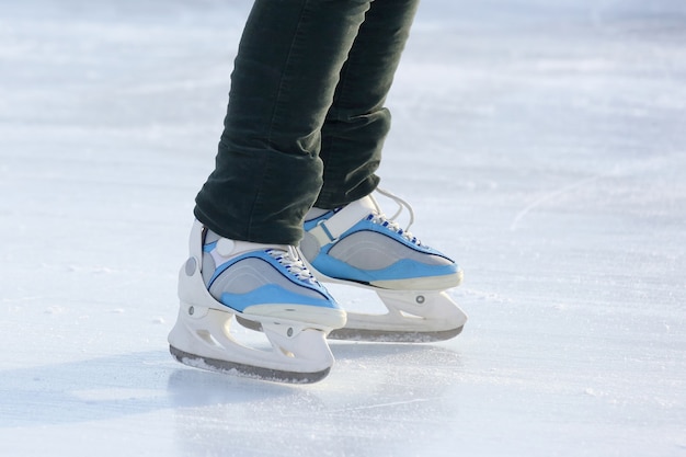 Foot ice-skating person on the ice rink