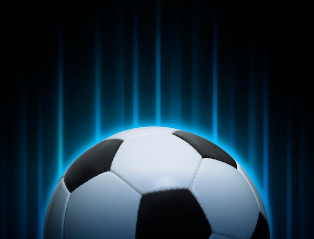 Football ball with abstract lights background Football ball game concept