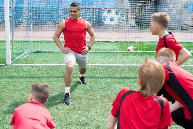 Football Coach Showing Exercise