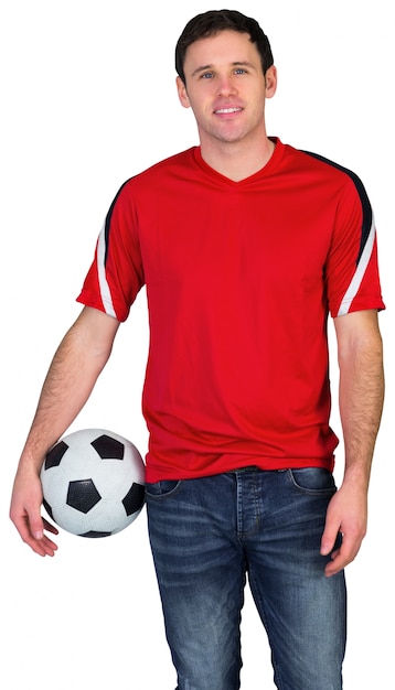 Football fan in red holding ball