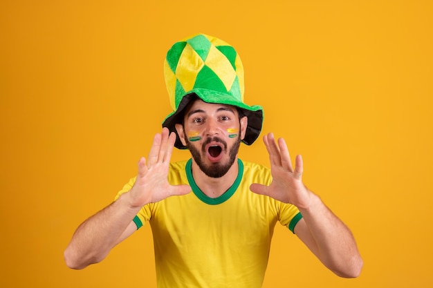 Football fanatic excited cheering man screaming goal