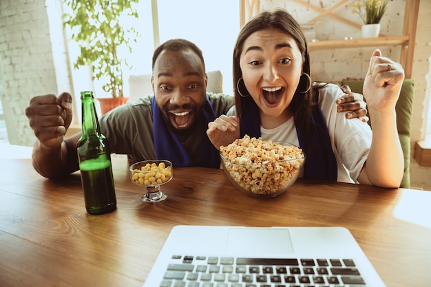 Football fans at home, sport. Watching stream