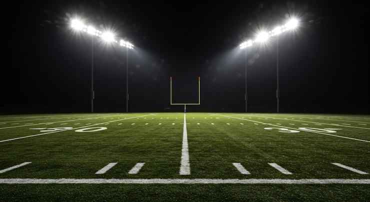 Photo football field at night background
