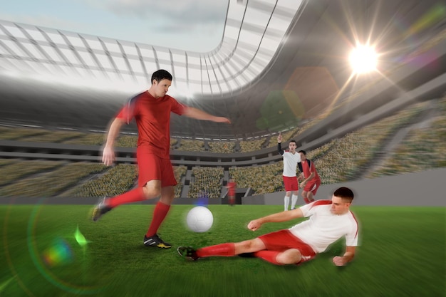 Football player in red kicking against football stadium