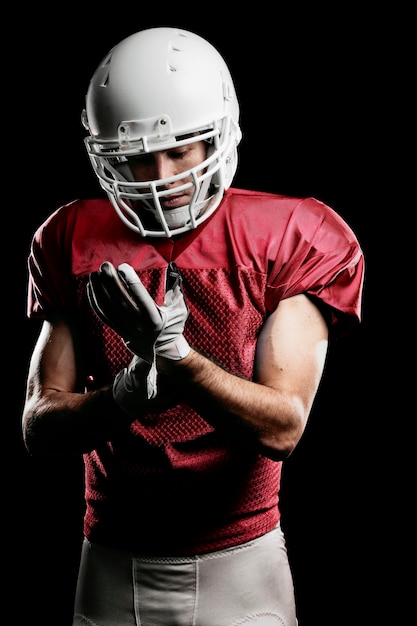 Football Player with number on a red uniform