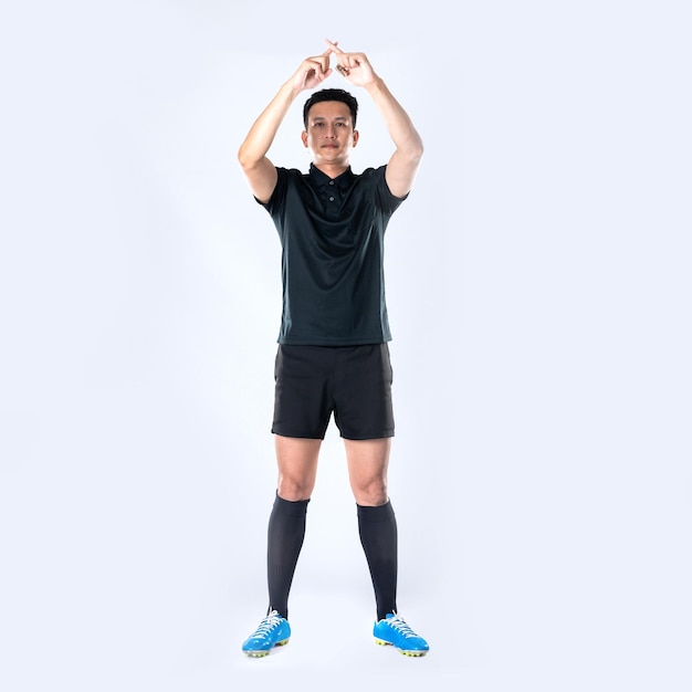 Football referee showing VAR symbol