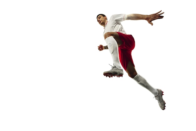 Football or soccer player on white background  motion action activity concept