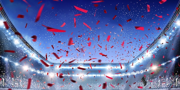 Football stadium background with flying confetti