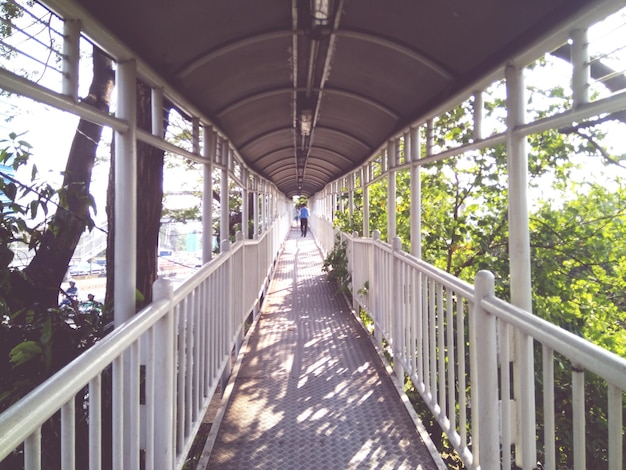 Footbridge over footpath