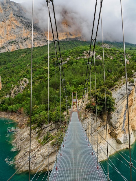 Footbridge Montrebei gorge over Canelles reservoir Catalonia Spain