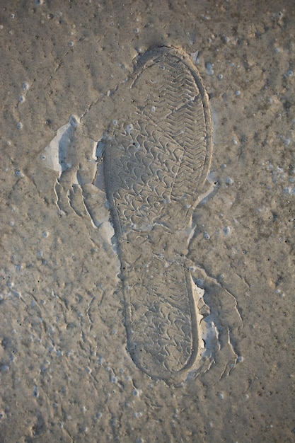 Footstep pattern on a concrete background