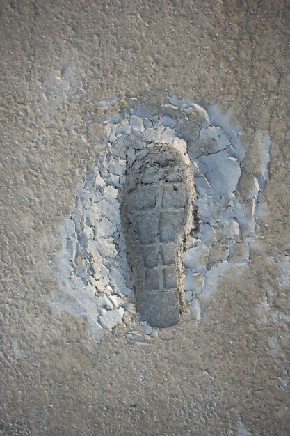 Footstep pattern on a concrete background