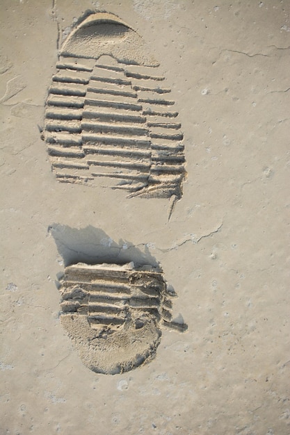 Footstep pattern on a concrete background