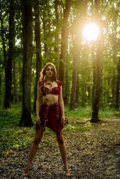Forest fairy fashion and culture wilderness of virgin woods\
wild attractive woman in forest folklore character living wild life\
untouched nature sexy girl wild human female spirit mythology