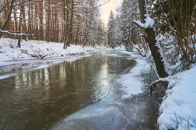 Forest river frees from ice in spring