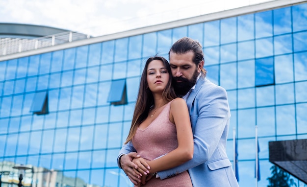 Forever love. guy embrace his girl outdoor. couple in love. feel the romance. first meet date. celebrate romantic holiday. family anniversary. pure feelings. bearded man hipster hug sexy woman.