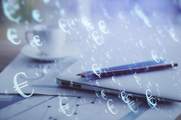 Forex graph hologram on table with computer background Double exposure Concept of financial markets