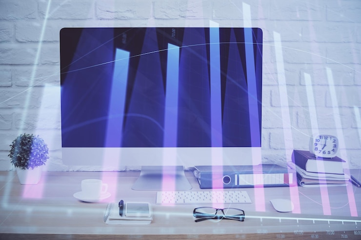 Photo forex graph hologram on table with computer background double exposure concept of financial markets
