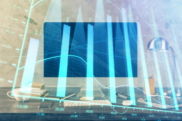 Forex market graph hologram and personal computer on background Multi exposure Concept of investment