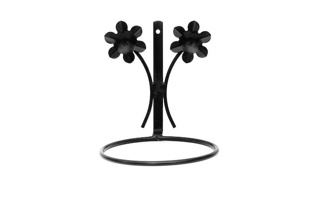 Forged metal pot holder for walls, isolated on white background. Decoration concept.