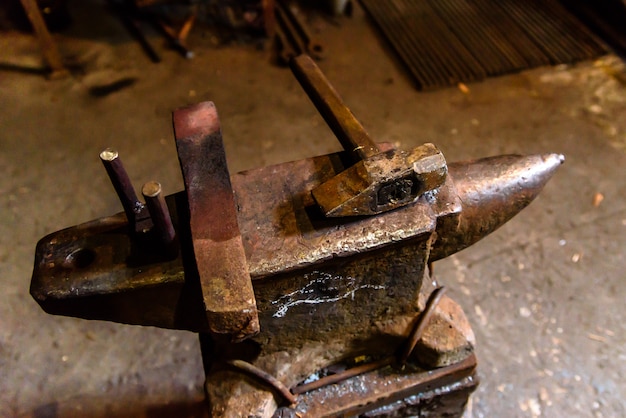 Forging molten metal. Making knives.